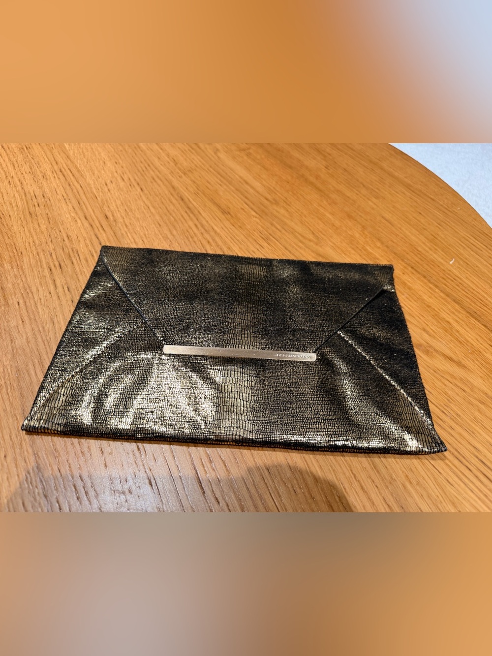 BCBGMaxAzria Golden Metallic Black Envelope Clutch